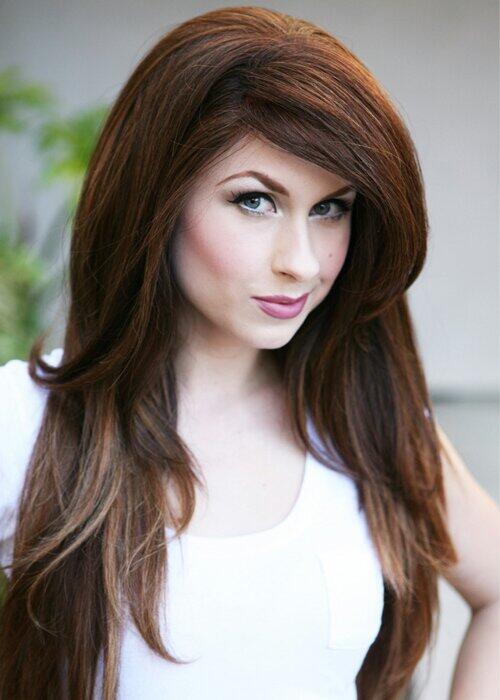 Belle ran a hand through her hair as she sat at the fountain with her favorite book as her hair flowed in the wind