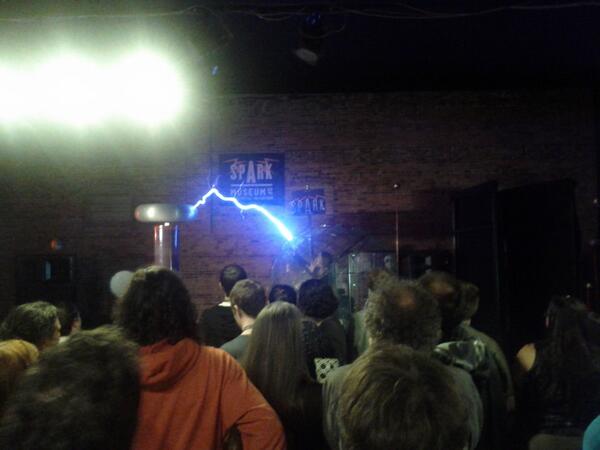 allisonrandal's tweet image. Me. In a Faraday cage. Up close and personal with a Tesla coil. #LinuxfestNW