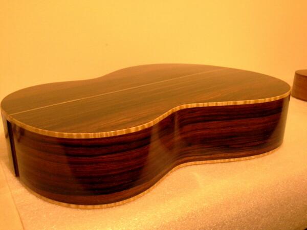 New cocobolo classical guitar body being French polished.