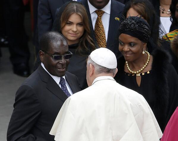 TheSun's tweet image. Saints and a sinner...
Popes become saints in front of a million - including tyrant Mugabe: bit.ly/1kkT0HZ