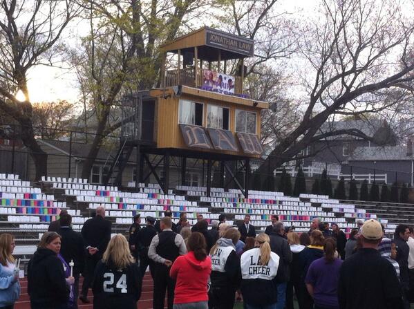 mgmcampbell's tweet photo. A sea of paper lanterns fill the stands at Law. The press box has been adorned with a banner reading #RIPMaren http://t.co/f7HWQYd8sA