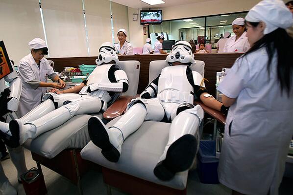 TheSun's tweet photo. The vampire strikes back -  Stormtroopers donate blood to mark annual Star Wars Day: http://t.co/OauzBiiTWX http://t.co/7iFMbnKMjK