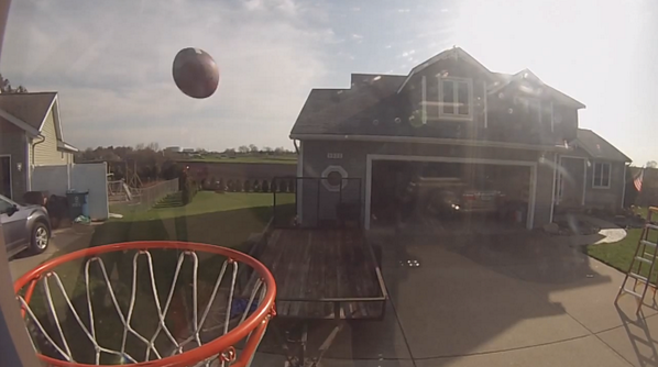 MLive's tweet photo. RT @GRPress This is insane: Watch video footage of Jenison friends sinking over-the-house hoop http://t.co/D6bysA6uWF http://t.co/iv6ZRAxPrF