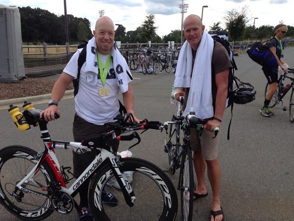 CGDIM2011's tweet photo. My #IMTrainingPartner @fire262 & I after conquering the Carolina Half by @JonesRacingCo last yr. #IMMaryland2014 http://t.co/XDOVTrMTYf
