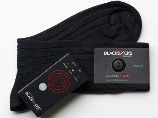 PriceRunner's tweet image. #PointlessTech - #blacksocks that communicate with your phone, what the...?