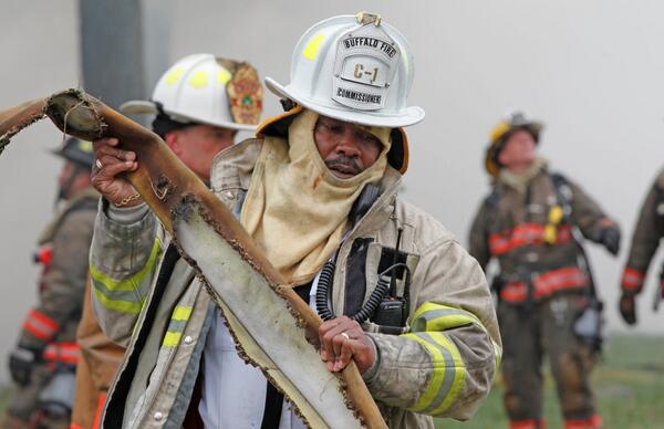 hsjrphoto's tweet photo. @BfloFire282 BuffaloFire Commissioner Garnell W. Whitfield, Jr. carries a damaged hose during a fire on Dupont Ave. http://t.co/AuIBmAK1ah