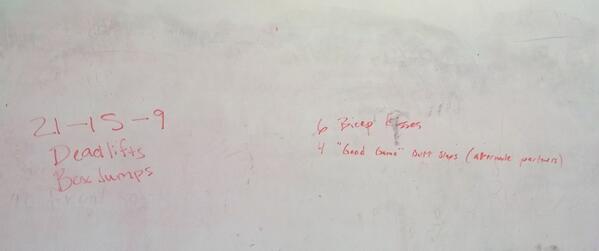Someone added their routine to the crossfit area's dry erase board in the gym