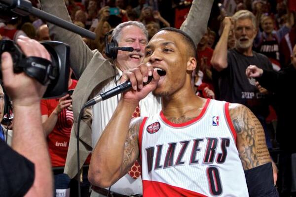 alexctam's tweet image. Great shot of @Dame_Lillard grabbing the mic at the end. #Blazers #RipCity