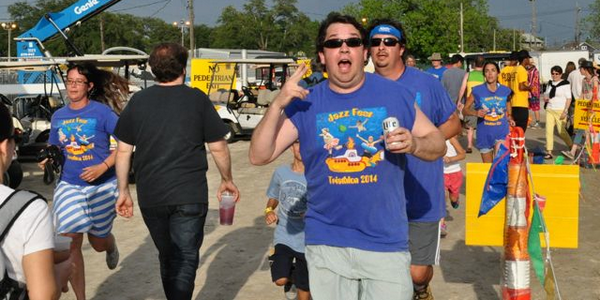 AXSTHEFEST's tweet photo. Exhibit A: The right way to run the triathlon @jazzfest. You sir, are a role model and a legend! #NOLA #axsthefest http://t.co/yQC8ZTKK7Z