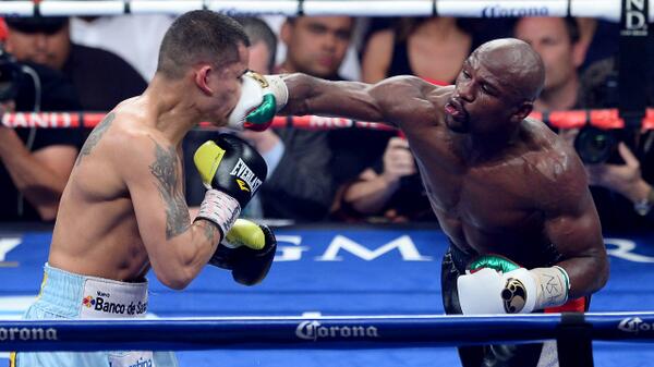 SportsCenter's tweet photo. #photooftheday: 46 have tried, 46 have failed. Money Mayweather STILL perfect after majority decision win vs Maidana. http://t.co/gYHhGFMtdj