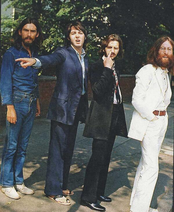 The Beatles waiting to cross Abbey Road, 1969. Photo by Iain Macmillan.