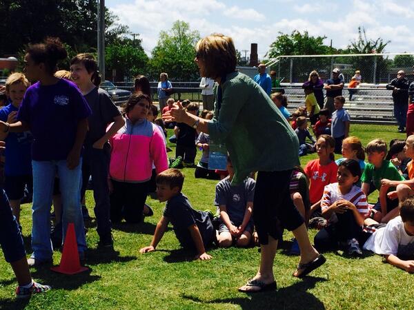 Mrs. Darnell cheering her HR at Field Day. <a href="/westelemcullman/">westelemcullman</a> <a href="/PEWestElem/">WEST Elementary PE</a>