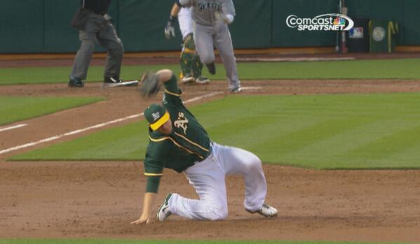 CaseyAPratt's tweet photo. Slick play by Brandon Moss in the 3rd. He looks like he's playing Twister. #Athletics #RightHandYellow, #LeftFootBlue http://t.co/EprRkGBly2