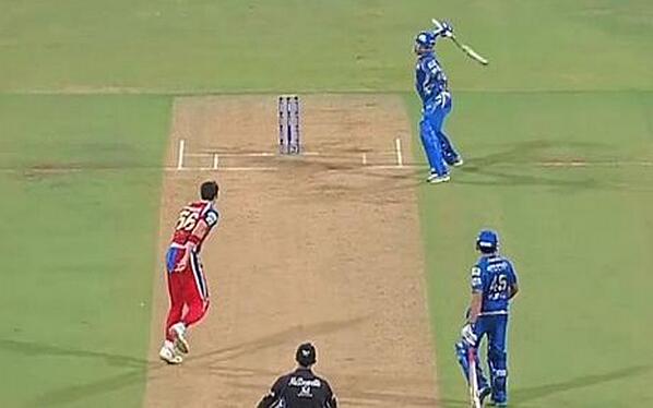 TelegraphSport's tweet photo. Video: Kieron Pollard launches bat at Mitchell Starc during heated IPL clash http://t.co/SlqwETWEWV http://t.co/55BhyTfAxC