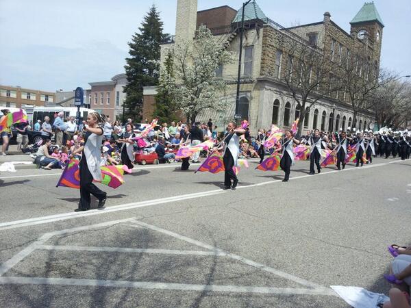 HollandSentinel's tweet photo. West Ottawa's color guard leads the band in the #kinderparade. #TulipTime2014 #tuliptime http://t.co/GcoCmHzeXe