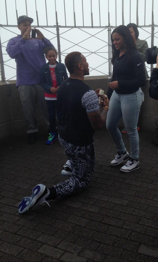 PSchrags's tweet photo. Here's UNC TE Eric Ebron, on bended knee, proposing atop the Empire State Building on Draft Day. She said yes. http://t.co/cpLeQtb5yt
