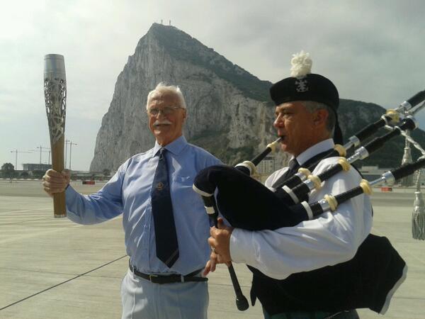 Pipers from the Gibraltar Sea Scouts Pipe Band herald the arrival of the Queen's Baton! #BatonRelay