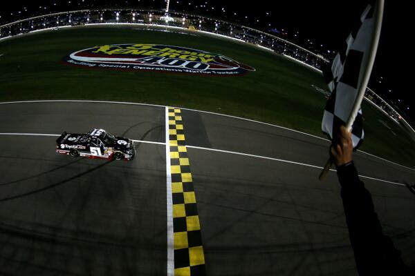 NASCAR's tweet photo. PHOTO: @KyleBusch takes the checkered flag to win the #NASCAR Camping World Truck Series #SFP250 at @kansasspeedway http://t.co/9kdRlEBUyE