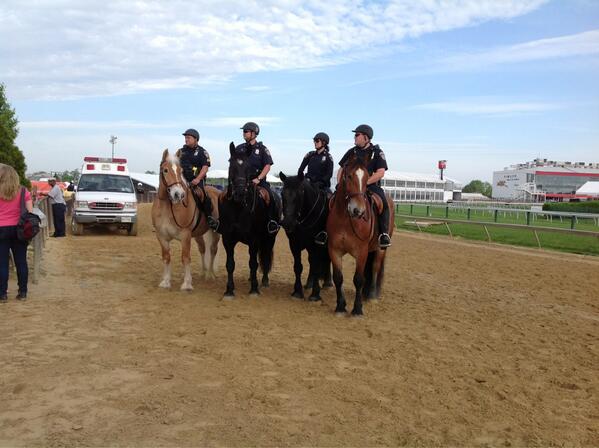 TheEquiery's tweet photo. @BaltimorePolice finishing a lap around @PimlicoRC for Canter for the Cure http://t.co/N3PkYjvBiQ