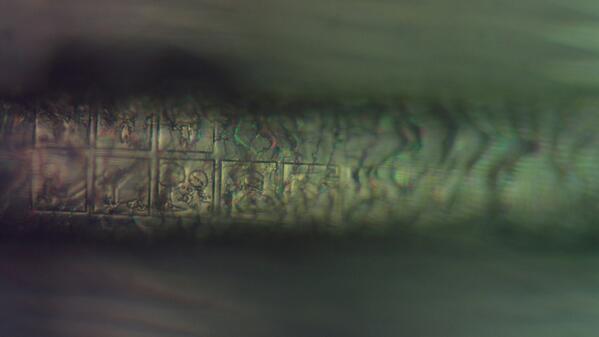 mashable's tweet image. The world's smallest comic strip was etched into a strand of human hair. on.mash.to/1iC66Rk via @discovery_news