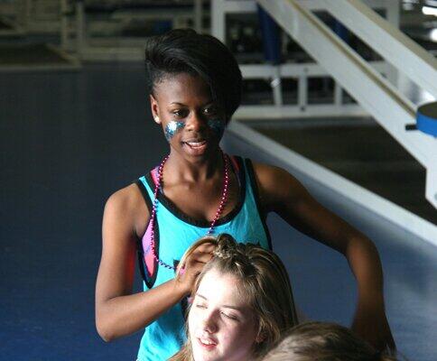 The juniors prepared for the game in the football field house.