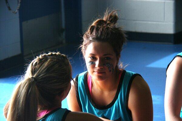 Both teams decorated themselves with glitter and black ink to show support for their class.