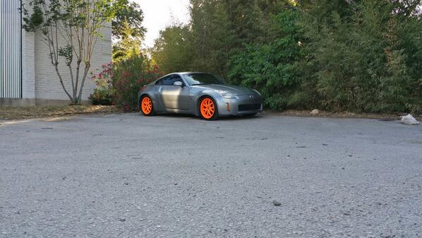 Dr_Sethers's tweet photo. Fresh detail #nissan #350z #fairlady #fairladyz #orangerims #orangewheels #forsale #orange #clean #hellanotflush lol http://t.co/QXdmAr6N7W