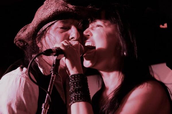 Thanks #CaraHeitman for this great shot of @ptiberius & me sharing a mic at #CMW. Thanks @jeanguykastner for the fun!