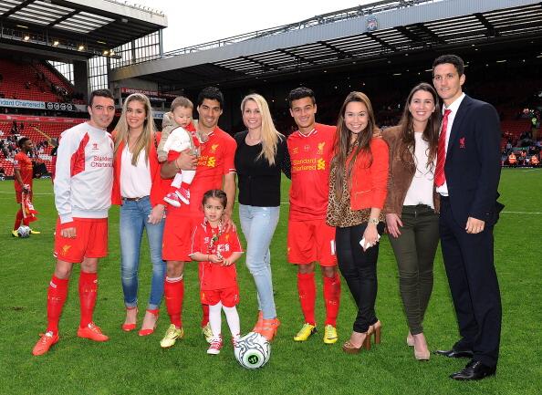 LFCphoto's tweet photo. At Anfield today. @aspas10, @luis16suarez, @Phil_Coutinho &amp; @14_luisalberto with their families &amp; loved ones. #LFC http://t.co/9F3n5sr7OJ