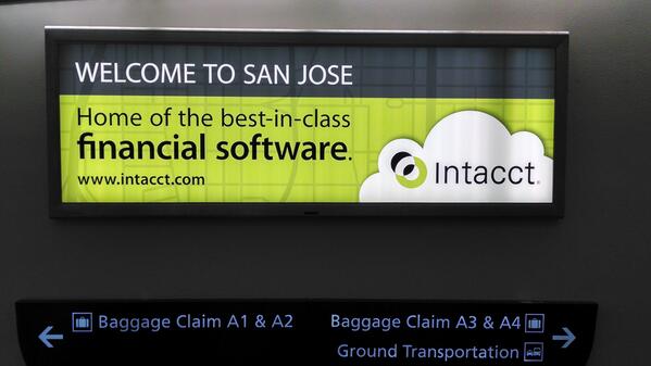 SageIntacct's tweet photo. #Intacct has a little message at the San Jose airport to welcome everyone arriving for #NSW14. http://t.co/TJpBHueXy1