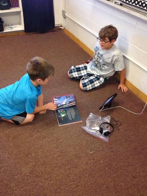 Students making text to self connections...very engaged in their book! 📚#cullmanbearcats