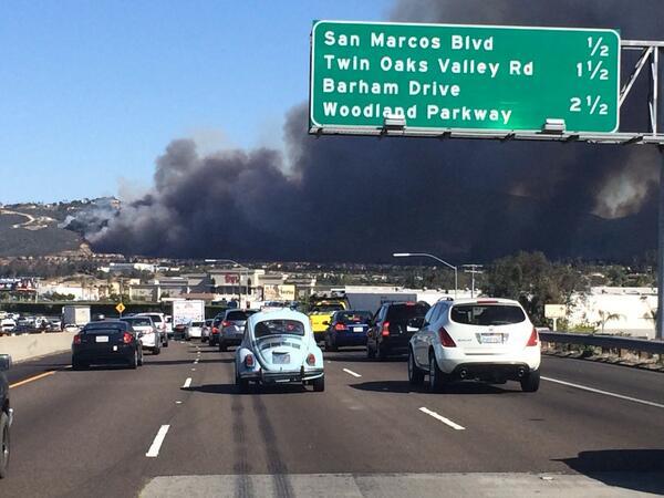 sdut's tweet photo. 10 surreal scenes from San Diego County's wildfires: http://t.co/wBZwEezD4M http://t.co/u6cyxIEema