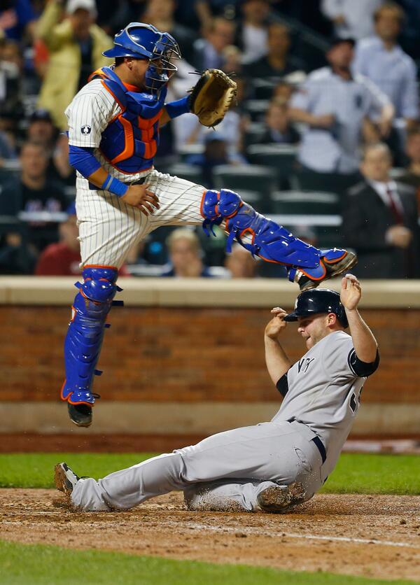 Yankees beat Mets, 1-0. The two teams split Subway Series with road team winning every game.