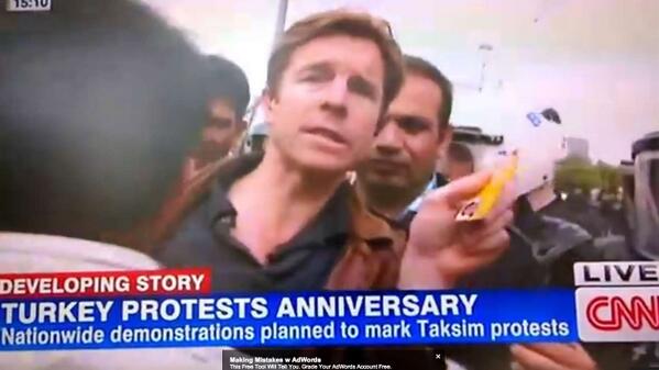 Turkish police detain a CNN reporter on-air on the Gezi anniversary. Watch the video: on.mash.to/RPdNsS