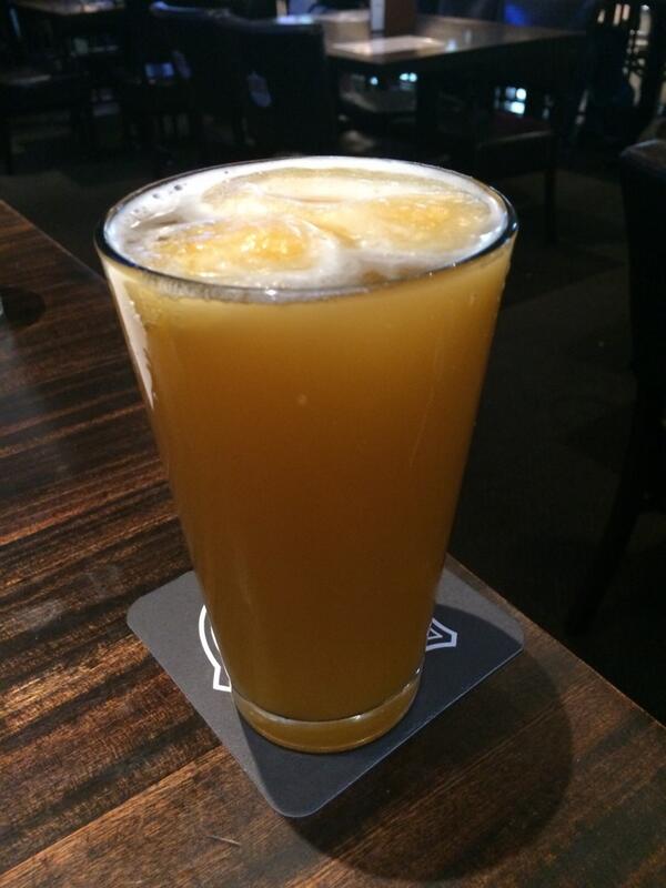Albyman44's tweet photo. Vacation starts with a Hefeweizen with a top of frozen Bellini cocktail!  Delicious!  #iceberg #summerdrink #beer http://t.co/BenJHwroUh