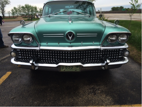 Buick's tweet photo. Our coolest #TBT yet: a throwback road trip in a 1958 Buick Roadmaster, documented by @TFLcar. http://t.co/untHIrmQKD http://t.co/0JqbgNxWC2