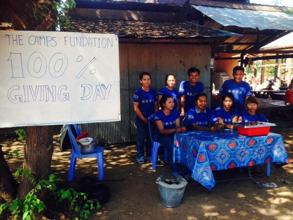 CampsAsia's tweet photo. And so Cambodia join the party #CampsGivingDay, better late than never as they say. Selling cookies near the temple http://t.co/0lhlDUqAov