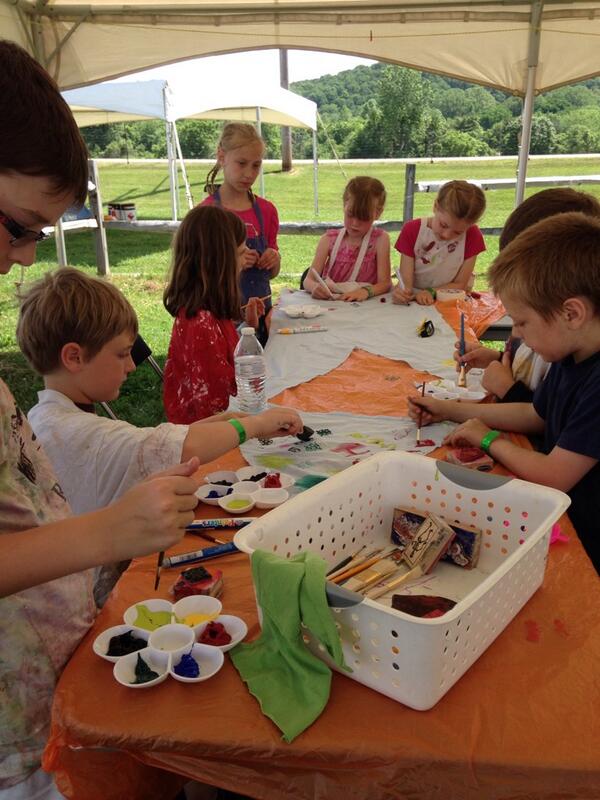drearocks7's tweet photo. Yay painting flags for the parade! #nmf14 http://t.co/BZC9ht7FJt