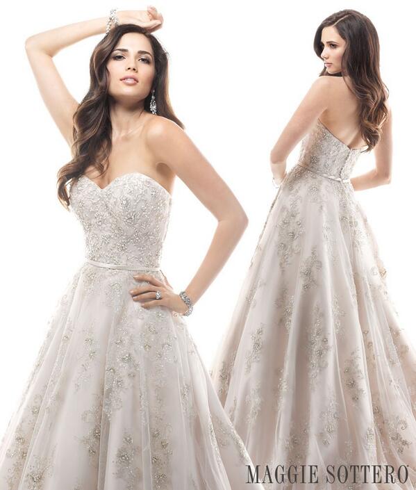 maggiesottero's tweet photo. Hannah, a beautiful ballgown with embellished lace and Swarovski crystals. #fridayfavorite http://t.co/7oUwVyr6kR http://t.co/Pp5s4SUT7q