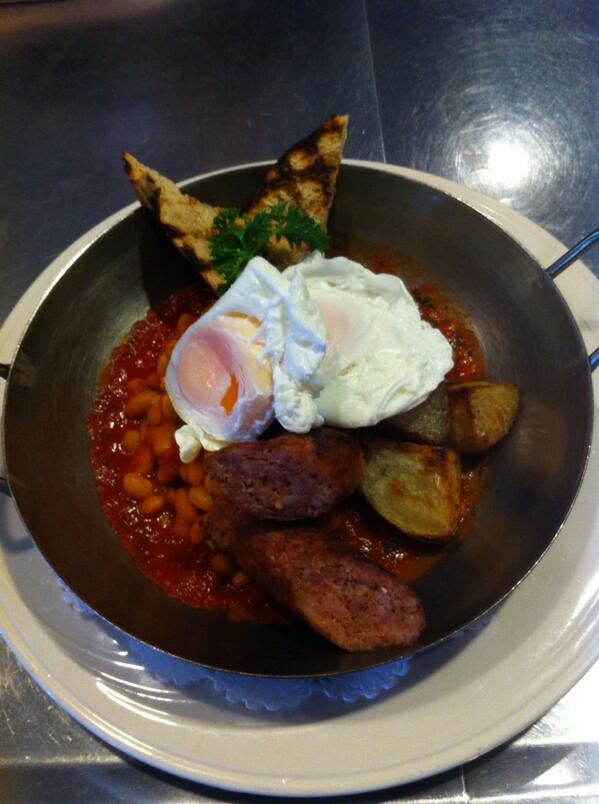 JayPare's tweet photo. Saturday and Sunday special @CarambaWhistler poached eggs on baked beans with sausage. Breakfast pizza as well!! http://t.co/b7Mw6vs4fO