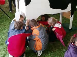 Bledlowshow's tweet photo. We've a special 'countryside learning area' for the kids to have a go at farming with Clare Morris @thecollegefarm2 http://t.co/W580fKKhfA