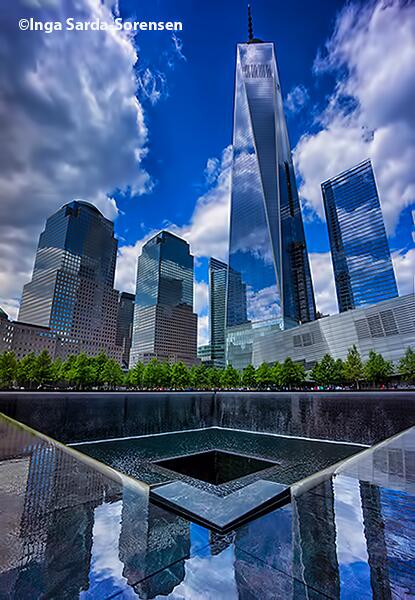 isardasorensen's tweet photo. The @Sept11Memorial site under today's blue skies &amp; billowy clouds. #NYC #WTC http://t.co/yQuCgY3rwV