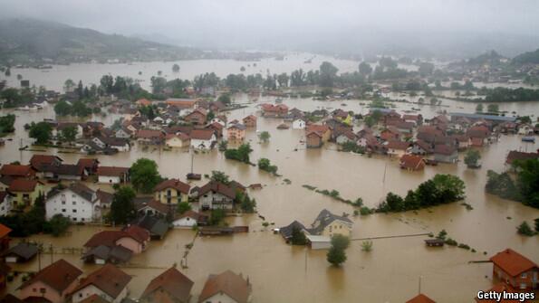 TheEconomist's tweet photo. Devastating floods have triggered a wave of solidarity across the former Yugoslavia http://t.co/vGpt2GBFuq http://t.co/e9V3LSOI3O