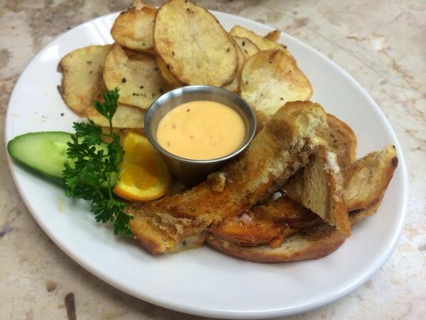 Tripke's tweet photo. Artisan grilled cheese sandwich, Havarti,  paprika, cracked pepper, mustard powder http://t.co/8H1vkThmNy