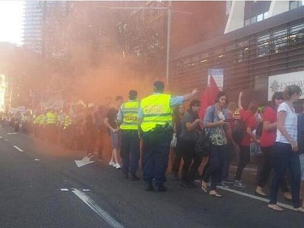 dailytelegraph's tweet photo. Man in his 20s arrested in Sydney uni protests with orange flare. #may21protest http://t.co/OKDmwQR0Ha http://t.co/XlpQRMQh7y
