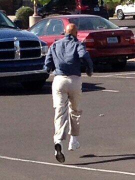 PhoenixPolice's tweet photo. Bank robbery suspect from this morning on the run, 48th Street and Warner. May have struck again, Call Silent witness http://t.co/zmIC7gjzSL