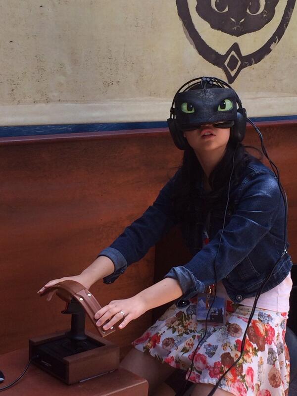 80sMovieGuide's tweet photo. @Cassandra_Hsiao rides a virtual dragon at #httyd2event "if only all video games were like that!" http://t.co/VuQLSXIaDT