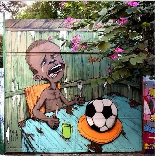 Slate's tweet photo. We spoke w/the Brazilian street artist who made this poignant, evocative anti-World Cup image: http://t.co/fmVRzmEiUB http://t.co/mbXUhNDgms