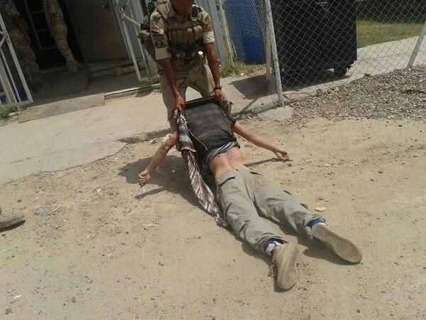 هكذا يتم سحلكم بيد الجيش العراقي #الدولة_الإسلامية_في_العراق_والشام