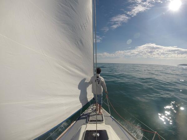 GoPro's tweet photo. Photo of the Day! Sail away on a tranquil blue sea with Ben Hopper. http://t.co/0Xmtr2EDcv